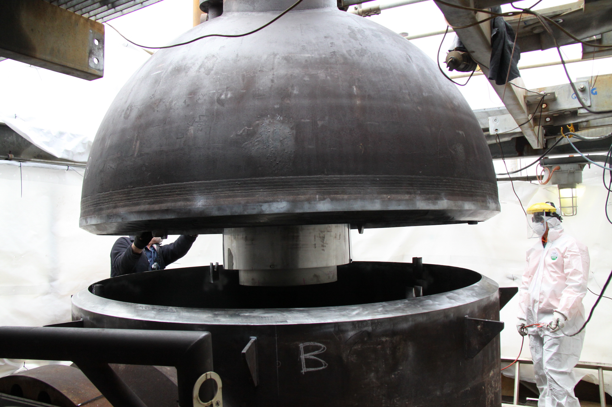 Lowering head onto shell